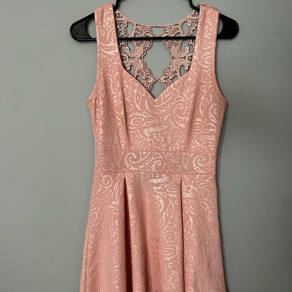 Short formal dress with back detail